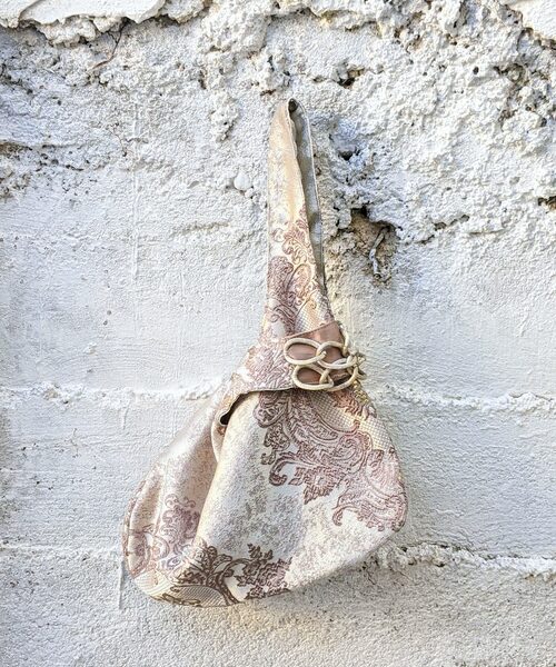 Reversible garment wristlet bag